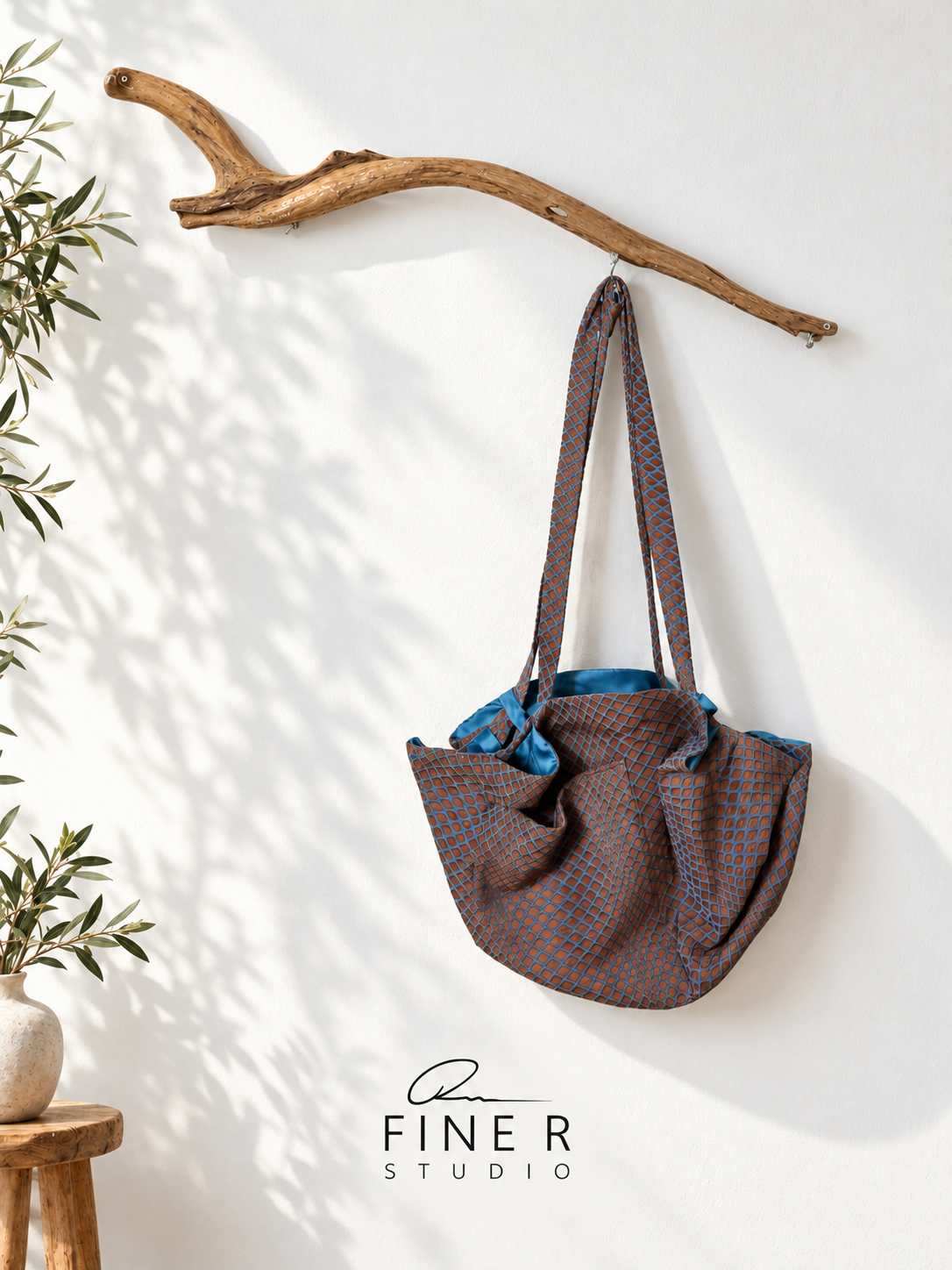 Fine R Studio brown and blue textured shoulder bag with blue lining and long straps.