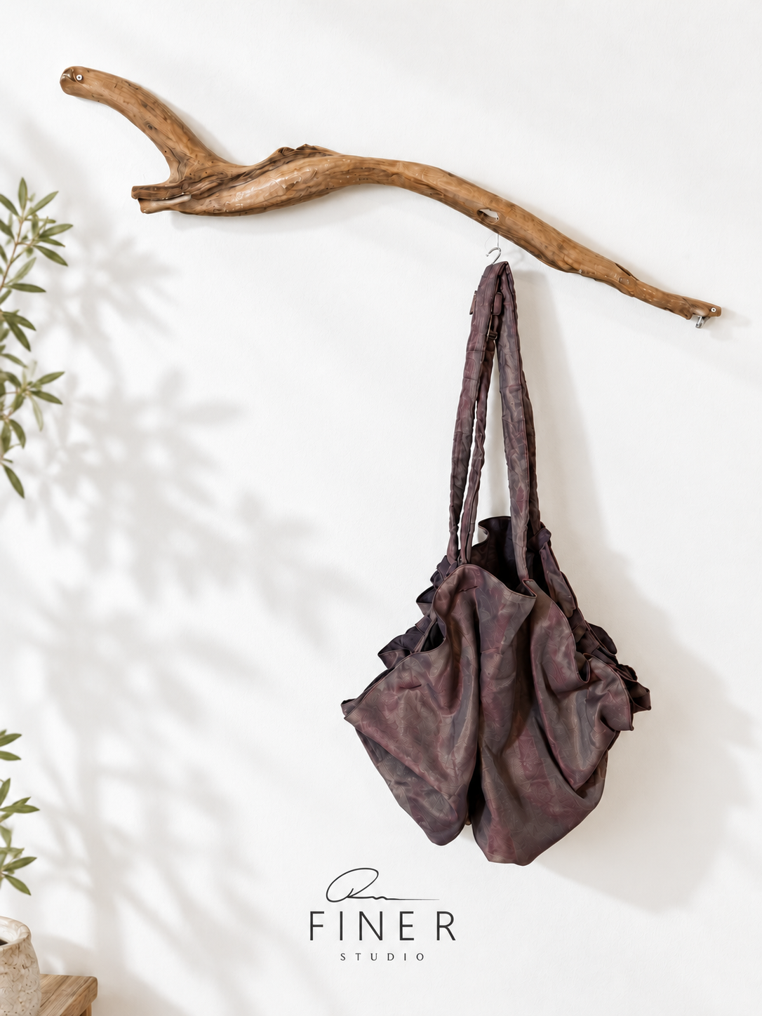 Fine R Studio plum textured fabric shoulder bag with long straps and gathered sides.