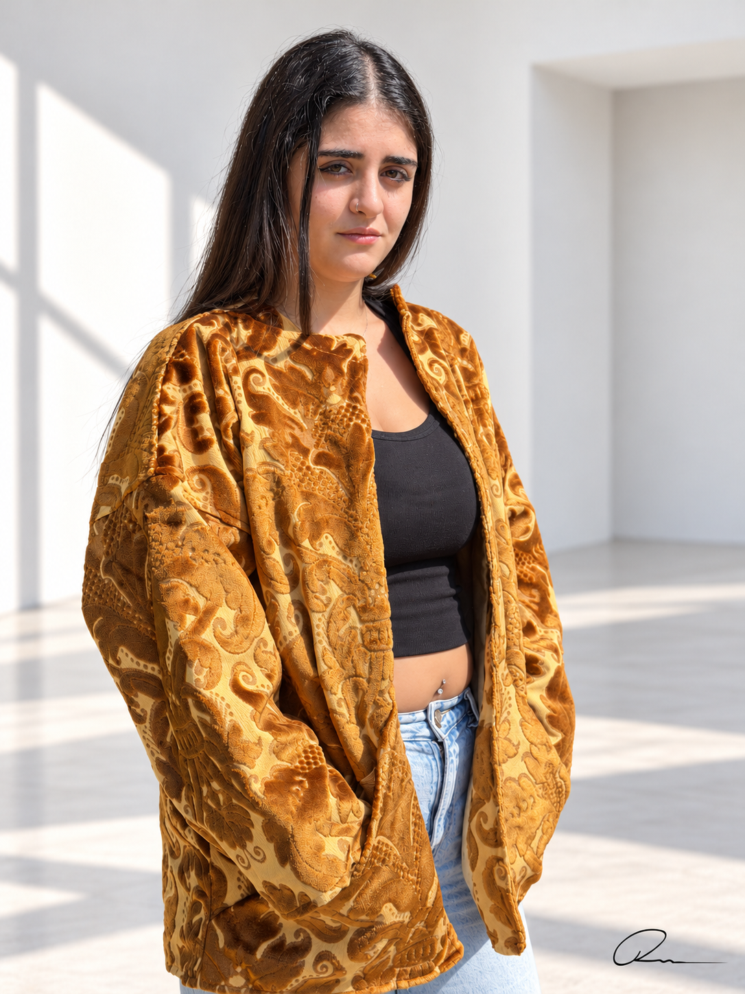 Front view of Fine R Studio gold floral velvet art jacket with raised damask motifs and an open front.